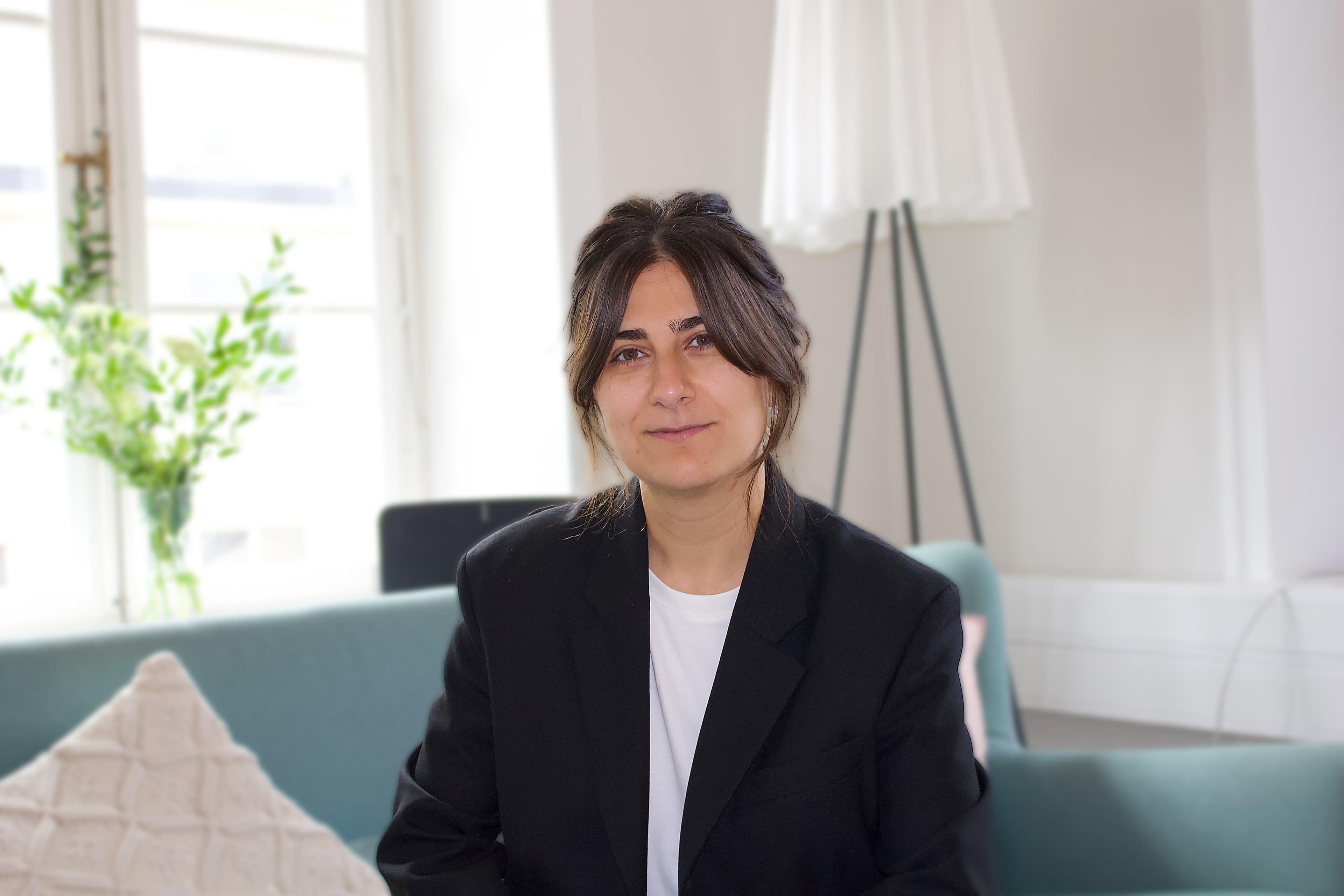 Sofia Akrami Image of Sofia Akrami in a black blazer and white tshirt.